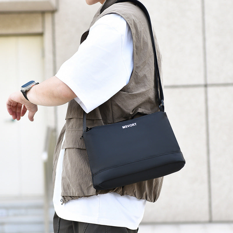 Cross-border new casual men's shoulder bag lightweight black versatile commuter men's bag Korean version trendy ins messenger bag