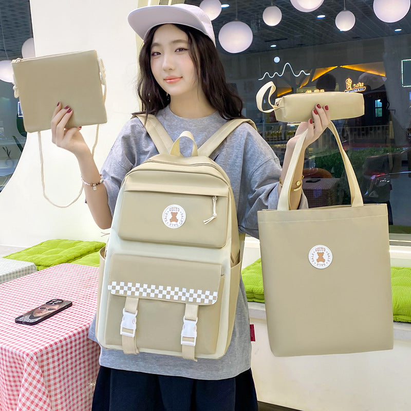 New primary school schoolbag women's lightweight large-capacity junior high school student campus backpack four-piece casual backpack bags