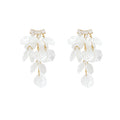 French chic seashell tassel earrings - exquisite, high-end, beachy vacation style studs - stunning statement earrings