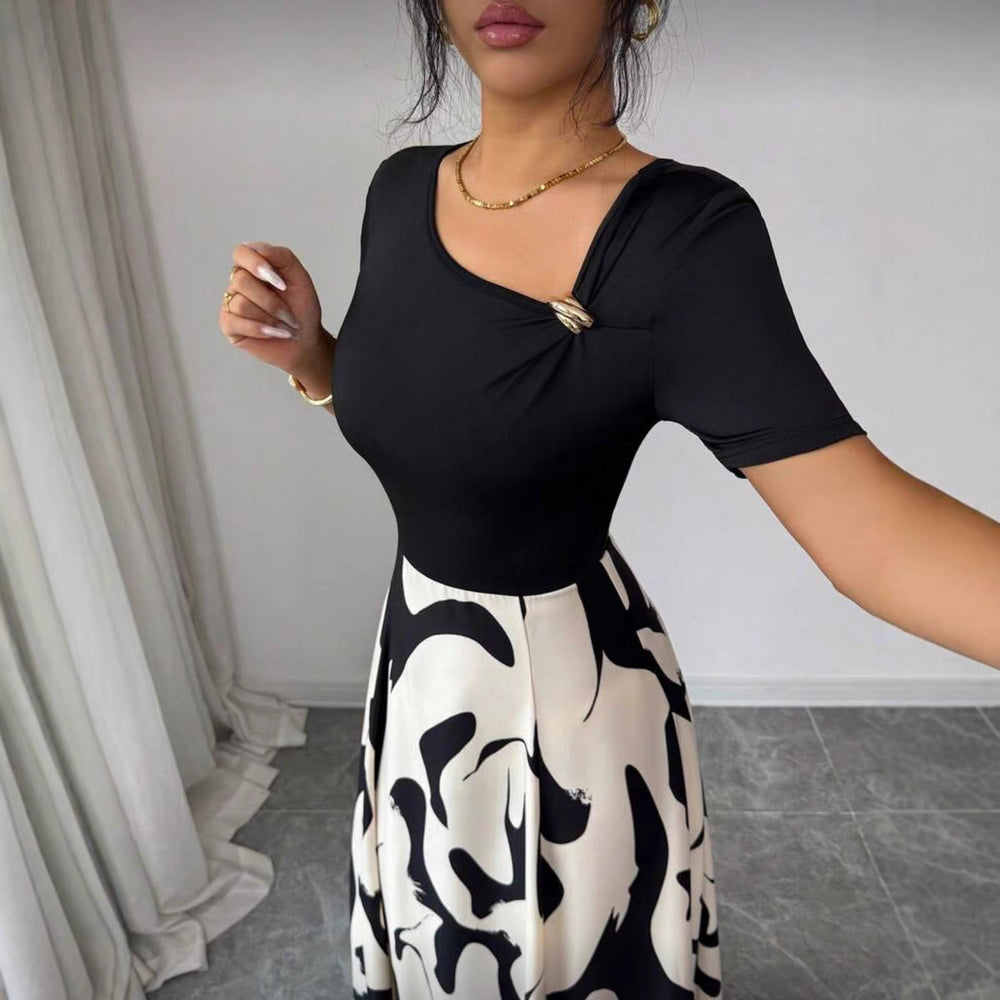 women's v-neck a-line dress with cinched waist, black and white abstract print, and metal buckle detail – elegant and versatile