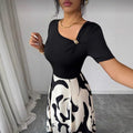 women's v-neck a-line dress with cinched waist, black and white abstract print, and metal buckle detail – elegant and versatile