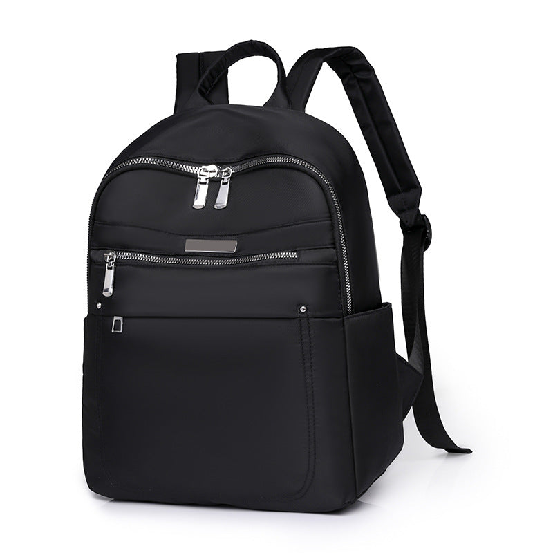Solid color fashion casual versatile backpack simple trend lightweight business women's computer bag wholesale student schoolbag