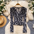 Sophisticated leopard print v-neck shirt: breathable, skin-friendly, long-sleeved top for women - perfect for summer, work, and a slimming, versatile look