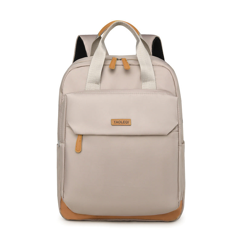 New large-capacity simple travel backpack, lightweight and trendy college student schoolbag, fashionable business commuter backpack.