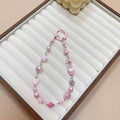 Creative cartoon kt rabbit alloy chain mobile phone lanyard wrist new diy handmade beaded crystal star bag pendant