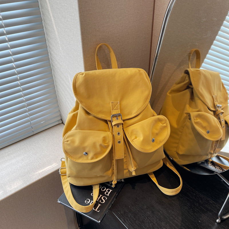 Solid color retro backpack women's 2025 new fashion travel leisure backpack double pocket college bag