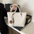 This year's trendy solid color women's bag: 2026 new fashion shoulder tote bag, versatile for commuting and casual use, women's handbag
