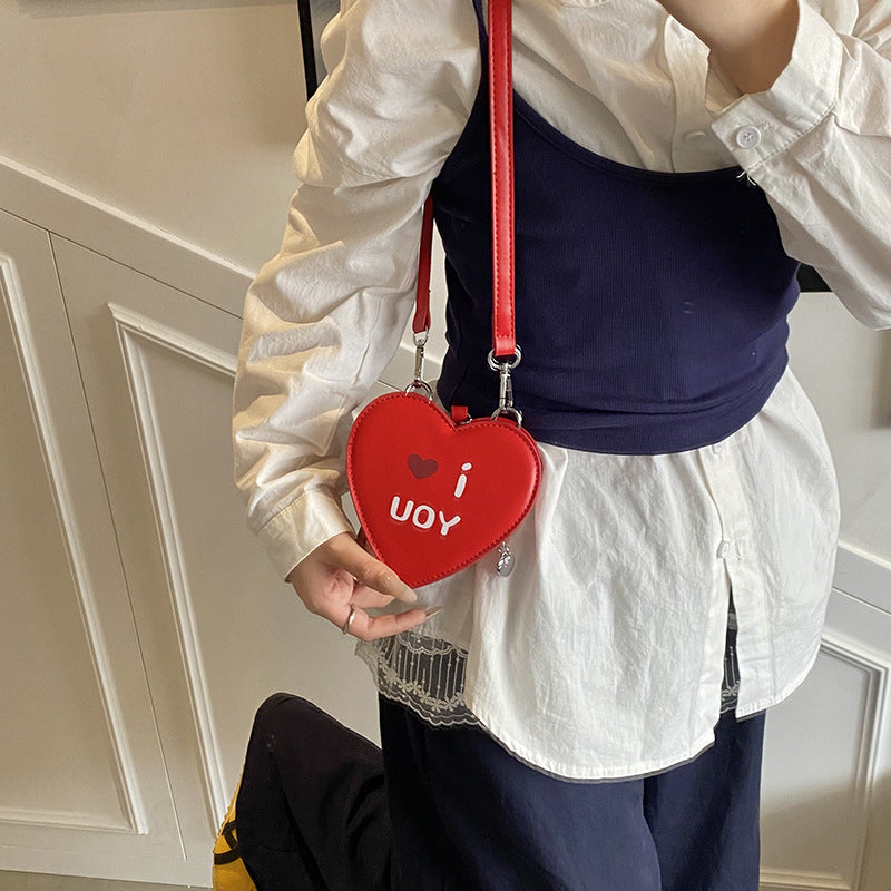 2025 summer new cute casual style small bag women's niche design sense messenger bag printed heart-shaped mouth red envelope