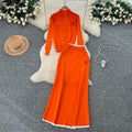Minimalist color block striped knit power suit: stand collar long sleeve sweater + high waist slim fit long skirt - winter collection