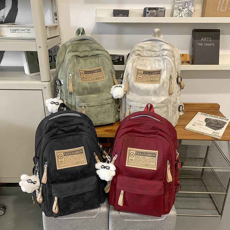 School bag female large capacity junior high school student backpack male new outdoor sports travel bag Korean version casual backpack