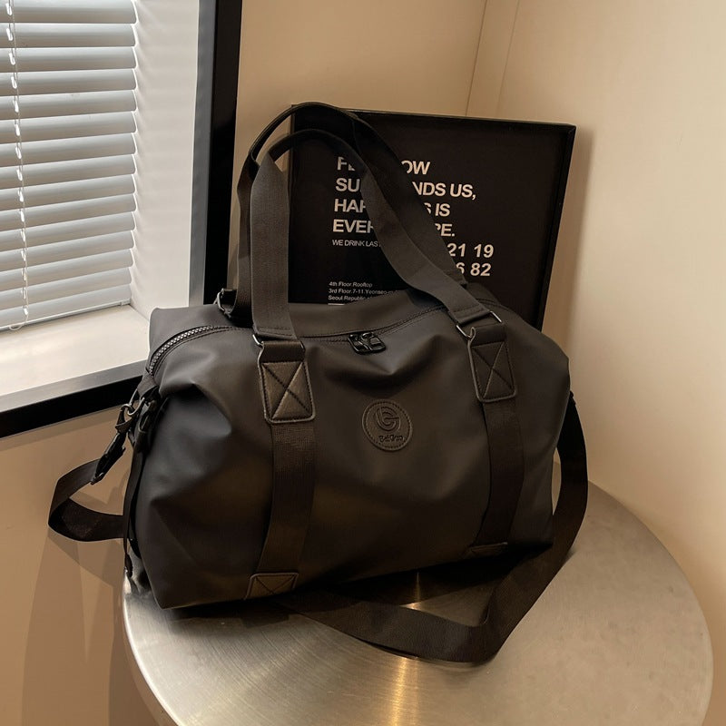 New travel bag women's travel portable hand luggage bag Korean version large-capacity messenger sports fitness bag travel bag