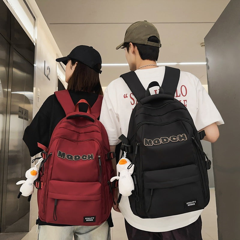 New schoolbag male college students large capacity high school junior high school students fashion versatile casual wear-resistant backpack letter bag