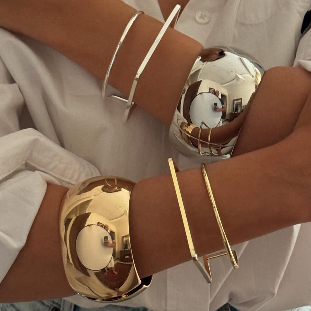 Wholesale alloy bracelets: european & american cross-border fashion jewelry - minimalist bangles with unique, bold geometric designs for women