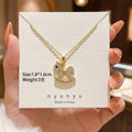 8149 cute rocking horse - gold