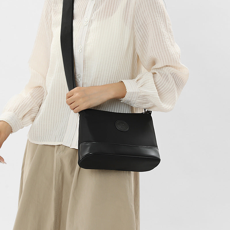 Cross-border color contrast trend women's bags, new casual and light commuting Oxford cloth shoulder bag, three-layer large-capacity messenger bag