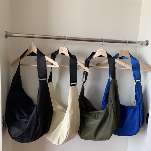 Bag women's Korean version of the new large-capacity nylon dumpling bag versatile casual couple model single shoulder oblique span sports bag tide