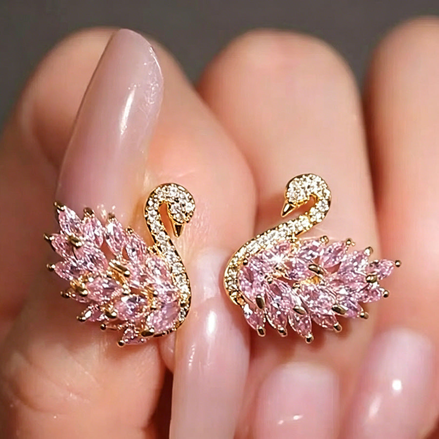 Copper alloy earrings: luxurious, exquisite, and ultra-sparkling zircon swan design. a chic and versatile statement piece for autumn and winter. hot-selling stud earrings