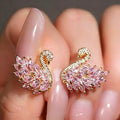 Copper alloy earrings: luxurious, exquisite, and ultra-sparkling zircon swan design. a chic and versatile statement piece for autumn and winter. hot-selling stud earrings
