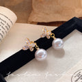 Sparkling butterfly pearl front and back two-wear stud earrings for women 2026 new arrivalniche stylesense of design earringselegant earrings