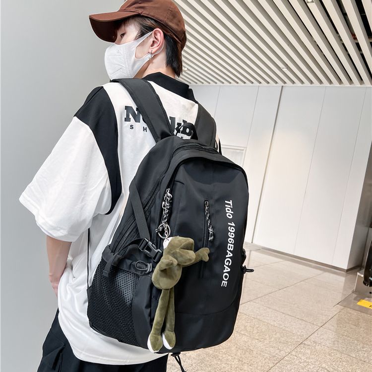 School bag male large capacity junior high school student middle school student fashion trend simple backpack female style travel bag