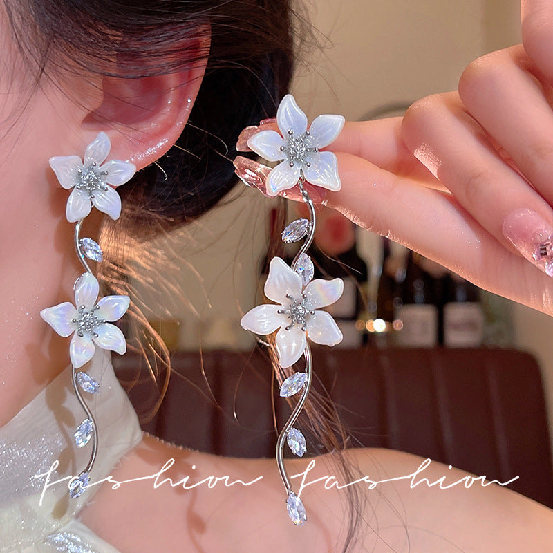 French chic zircon tassel flower stud earrings - perfect for summer getaways, beach photoshoots, and adding a touch of glam to your look