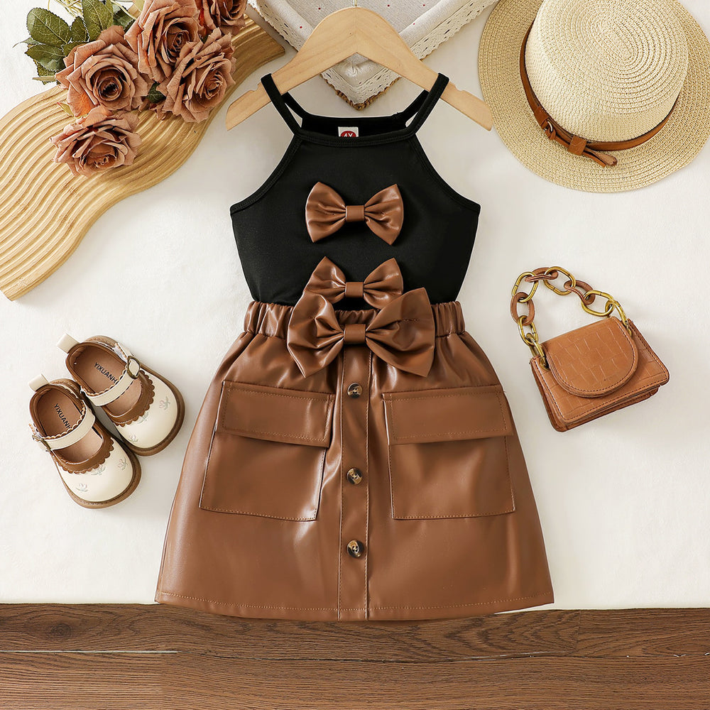 cross-border girls' fashion bowknot solid color camisole + pu leather skirt two-piece set