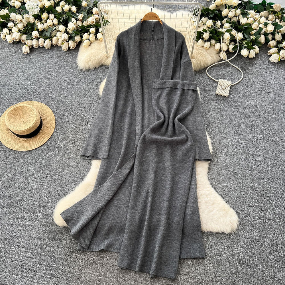 Minimalist solid color knitted mature woman's winter set: slim-fit bandeau dress with long cardigan coat