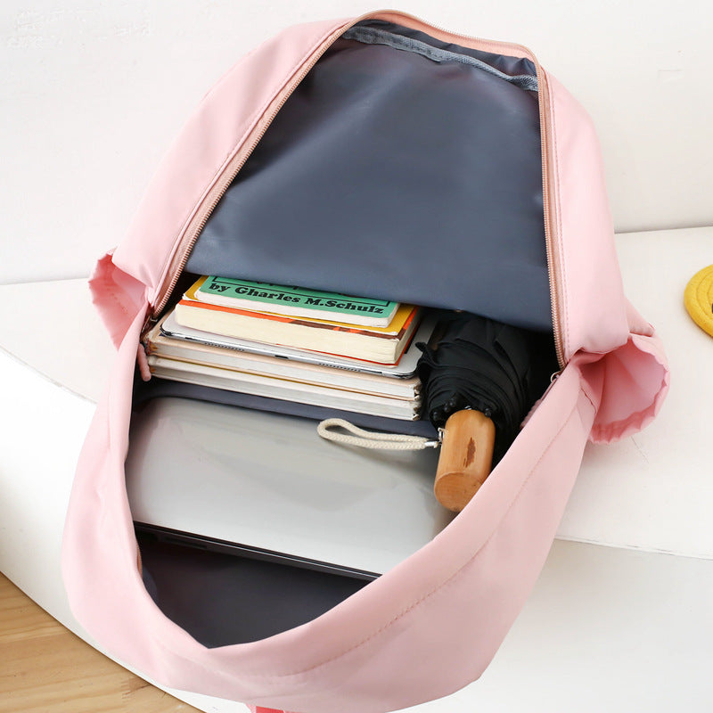 School season primary and secondary school students schoolbag make-up bag four-piece Korean version small fresh large capacity backpack student schoolbag