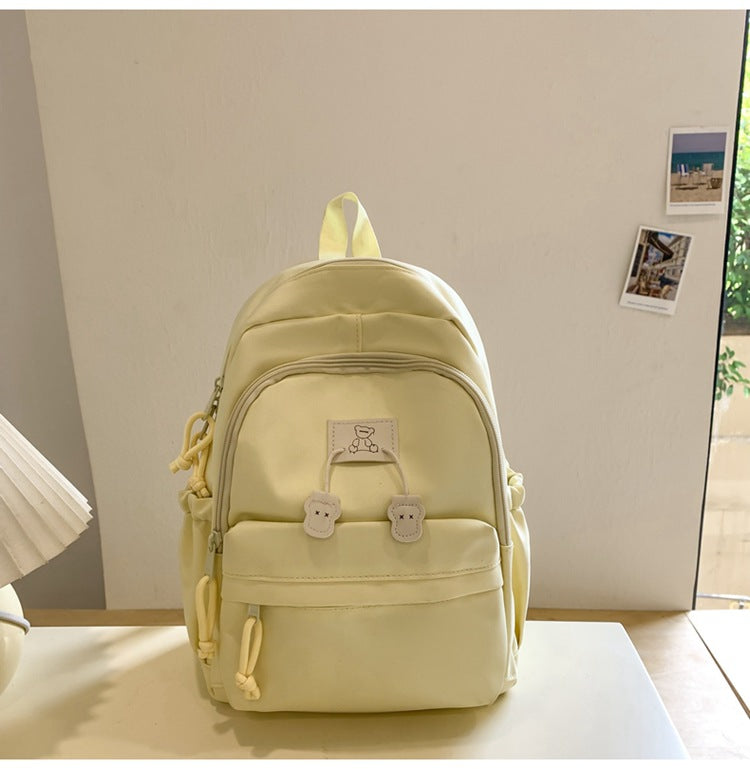 School bag female college student Korean version ins solid color simple and versatile junior high school student travel small backpack high school student backpack