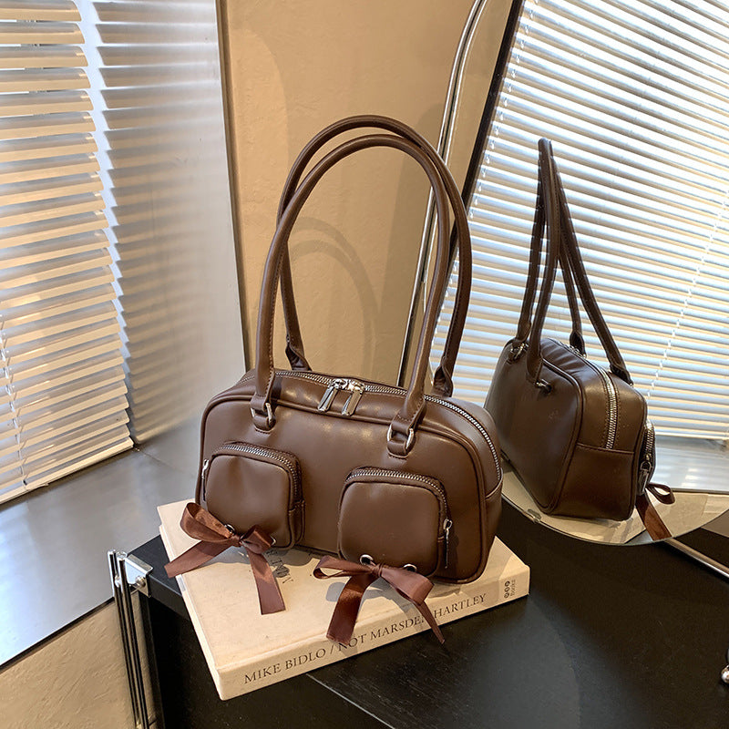 Simple retro underarm bag women's 2025 winter new Korean version niche portable commuter shoulder bag