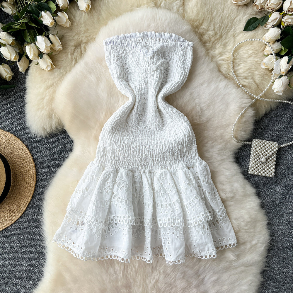 New women's vacation dress: designer ruched sleeveless bandeau dress with cinched waist, slimming cutout embroidery, and ruffle hem