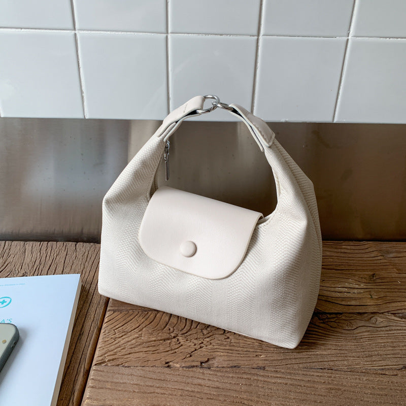 Foreign trade is popular this year, handheld small bags for women 2025 new fashion shoulder dumpling bags, commuter messenger bags to work