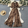 Summer vacation chic: effortless & mature casual v-neck short sleeve jumpsuit with elastic waist, high waist, slimming wide leg, and printed design