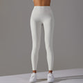 High-waisted, barely-there yoga pants for women, designed with a no-ride-up waistband for a seamless look. these figure-hugging, peach-shaped leggings offer a lift and a comfortable, stretchy fit, perfect for workouts and fitness activities. custom manufa