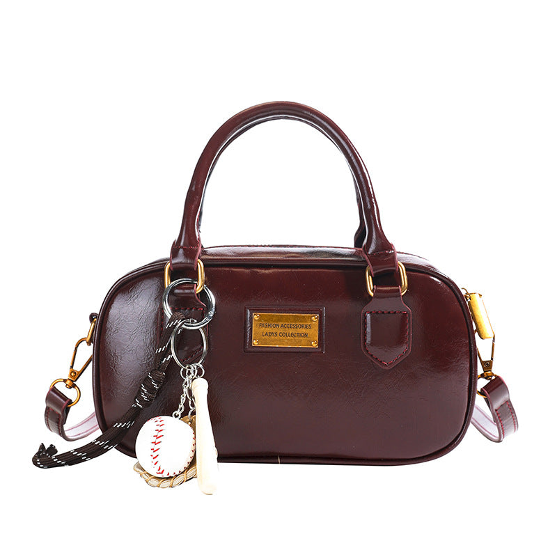 Spring new trend casual shoulder handle women's Korean version fashion commuter women's messenger bag versatile bowling bag