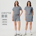 Women's casual activewear set: loose-fit breathable short-sleeve t-shirt & air layer shorts - perfect for yoga & workout