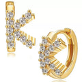European and american jewelry: ear cuffs, diamond-studded small hoop earrings, stud earrings, and ear bone rings