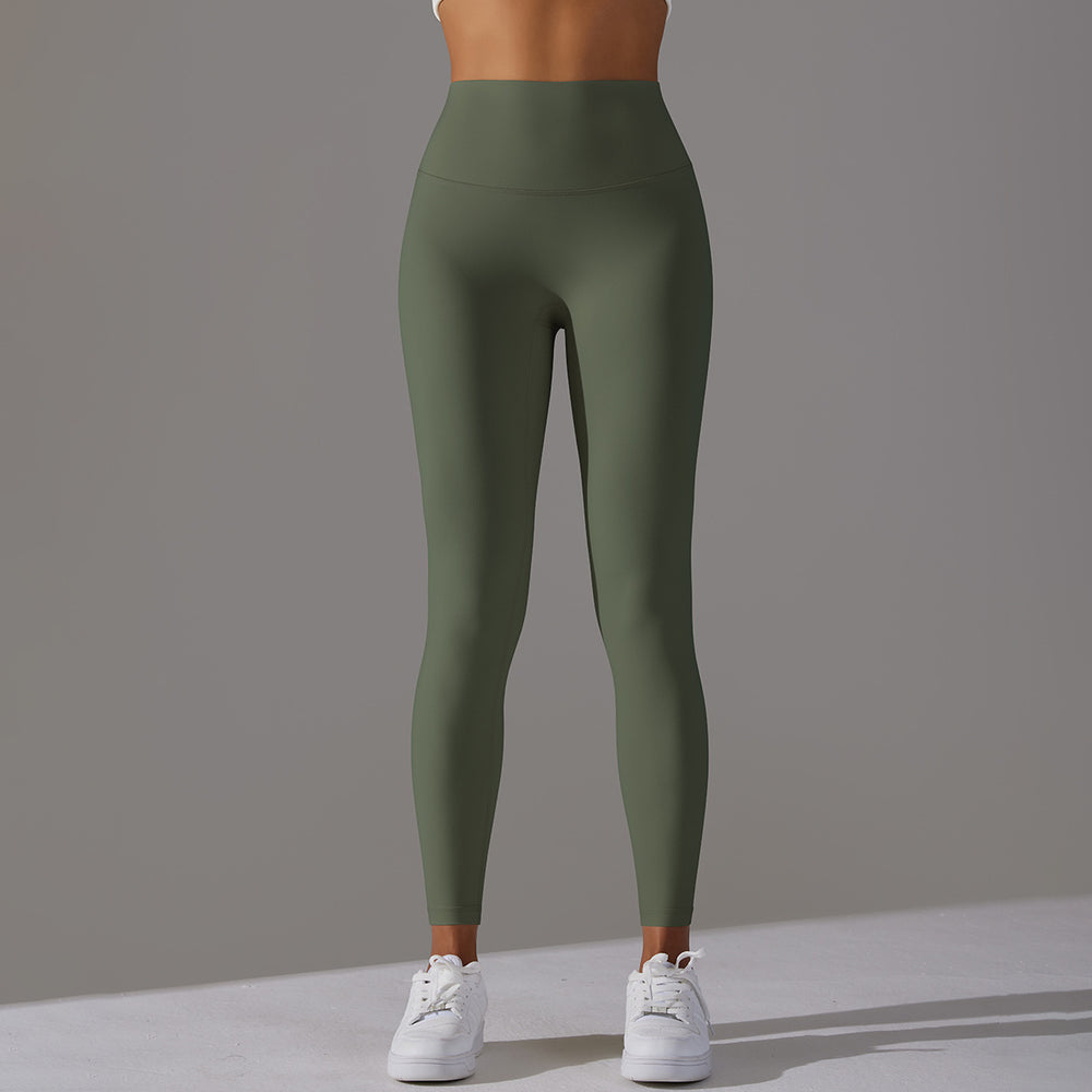 High-waisted, barely-there yoga pants for women, designed with a no-ride-up waistband for a seamless look. these figure-hugging, peach-shaped leggings offer a lift and a comfortable, stretchy fit, perfect for workouts and fitness activities. custom manufa
