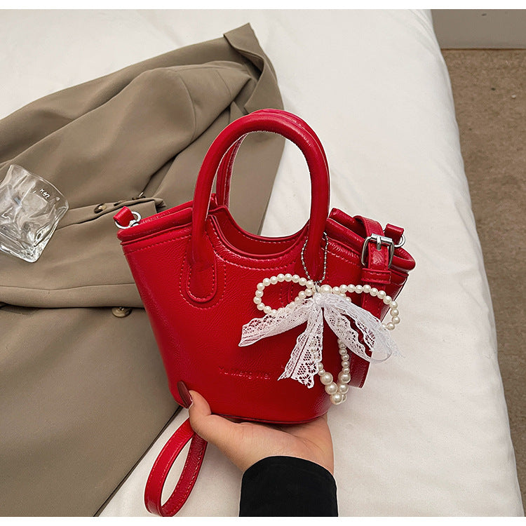 Cross-border texture contrasting handbag bag 2025 new fashionable versatile foreign gas bucket bag casual simple messenger bag