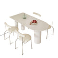 Creamy white rock slab dining table and chair set - modern minimalist semi-circular dining table for small spaces