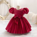 Ready-to-ship wholesale toddler evening gowns, fabric bows, princess dresses, piano recital dresses, and baby dresses