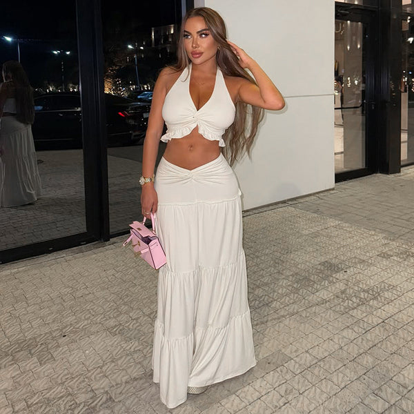 European and American style ins  solid color fashionable and sexy pleated skirt set hanging neck, open button, chest wrapping V-neck two-piece women's clothing