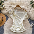 Korean style commute chic off-the-shoulder t-shirt: soft, breathable, relaxed fit with a cinched waist and asymmetrical design