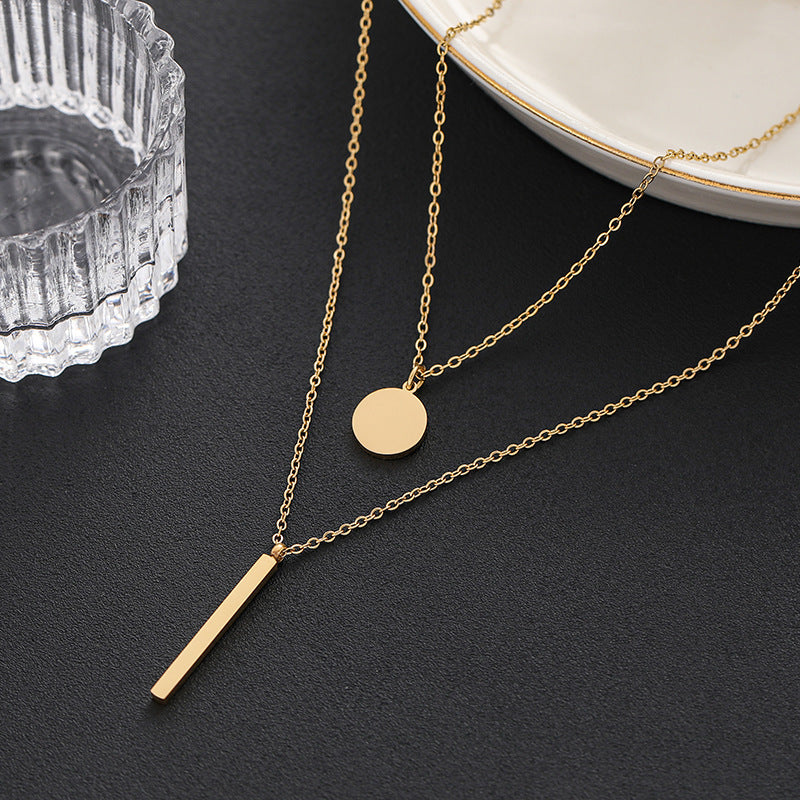 Gold double-layer round and vertical bar pendant necklace - stylish, elegant, minimalist, and versatile choker for women, perfect for office and everyday wear