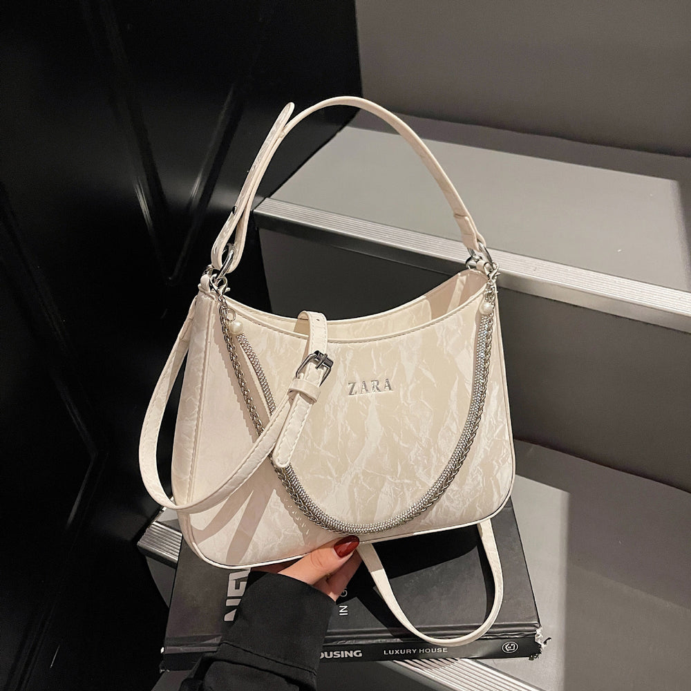 High-end women's bag, large capacity, 2025 new style, niche design, shoulder bag, crossbody bag, understated luxury, textured, commuter tote bag