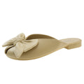French-style slip-on mules with bow detail, new for summer 2025. unique, fairy-like, flat, retro sandals