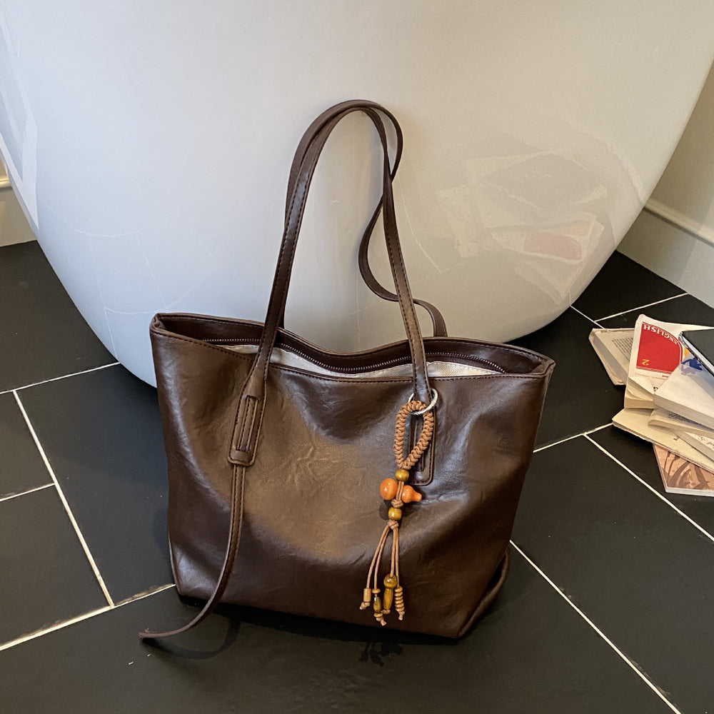 High-end retro soft leather women's bag 2026 new simple tote bag cross-border easiest for matchpure color handbag armpit bag