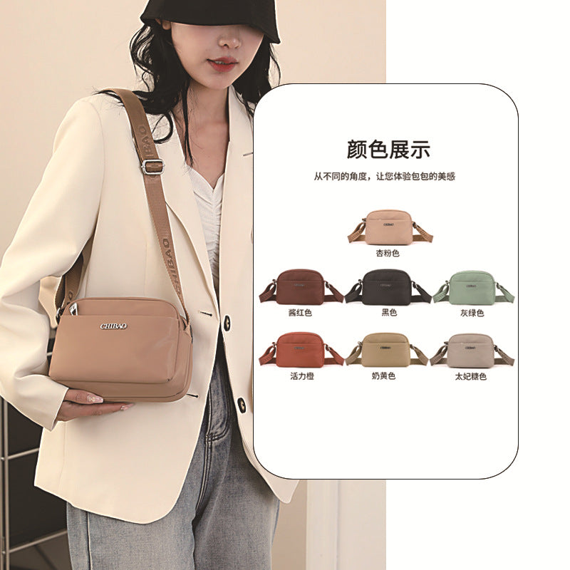 Foreign trade new lightweight messenger bag bag women's solid color simple nylon cloth casual shoulder bag portable commuter small square bag