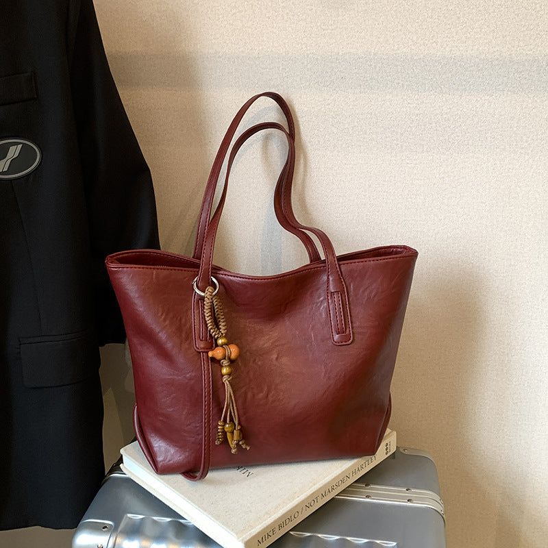 High-end retro soft leather women's bag 2026 new simple tote bag cross-border easiest for matchpure color handbag armpit bag