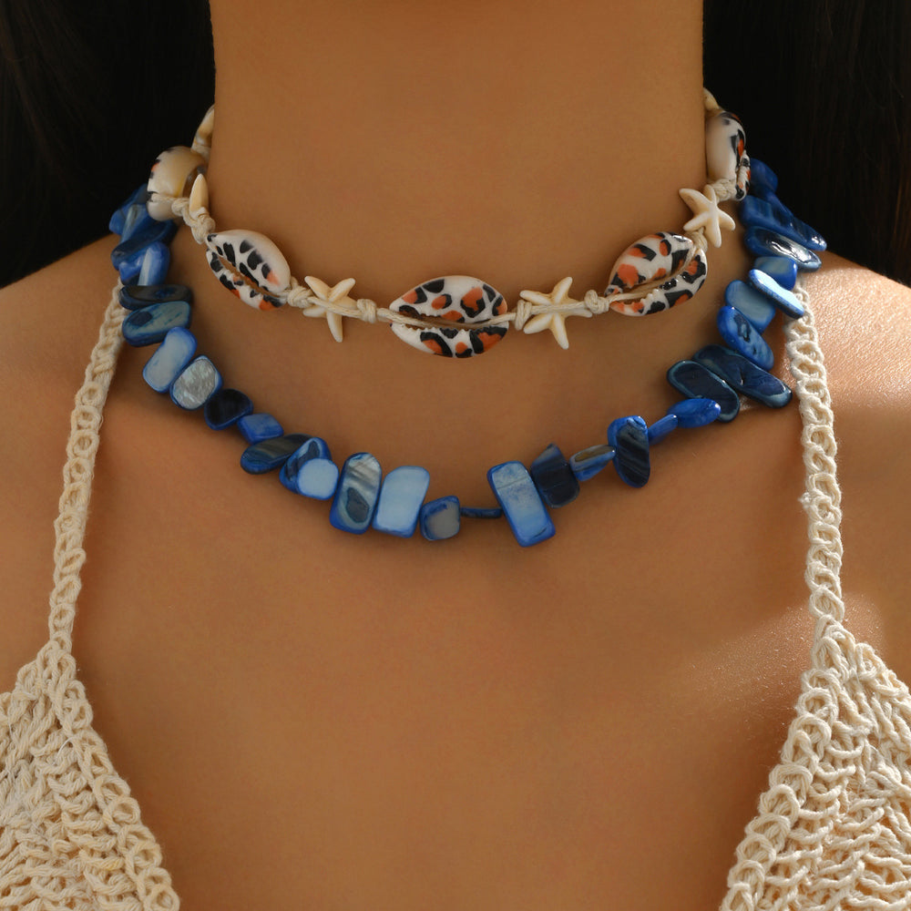 Wholesale seaside necklaces: european and american cross-border ocean-inspired statement jewelry featuring exaggerated shell pendants, light luxury, niche designs, and dyed crushed stone accents for women